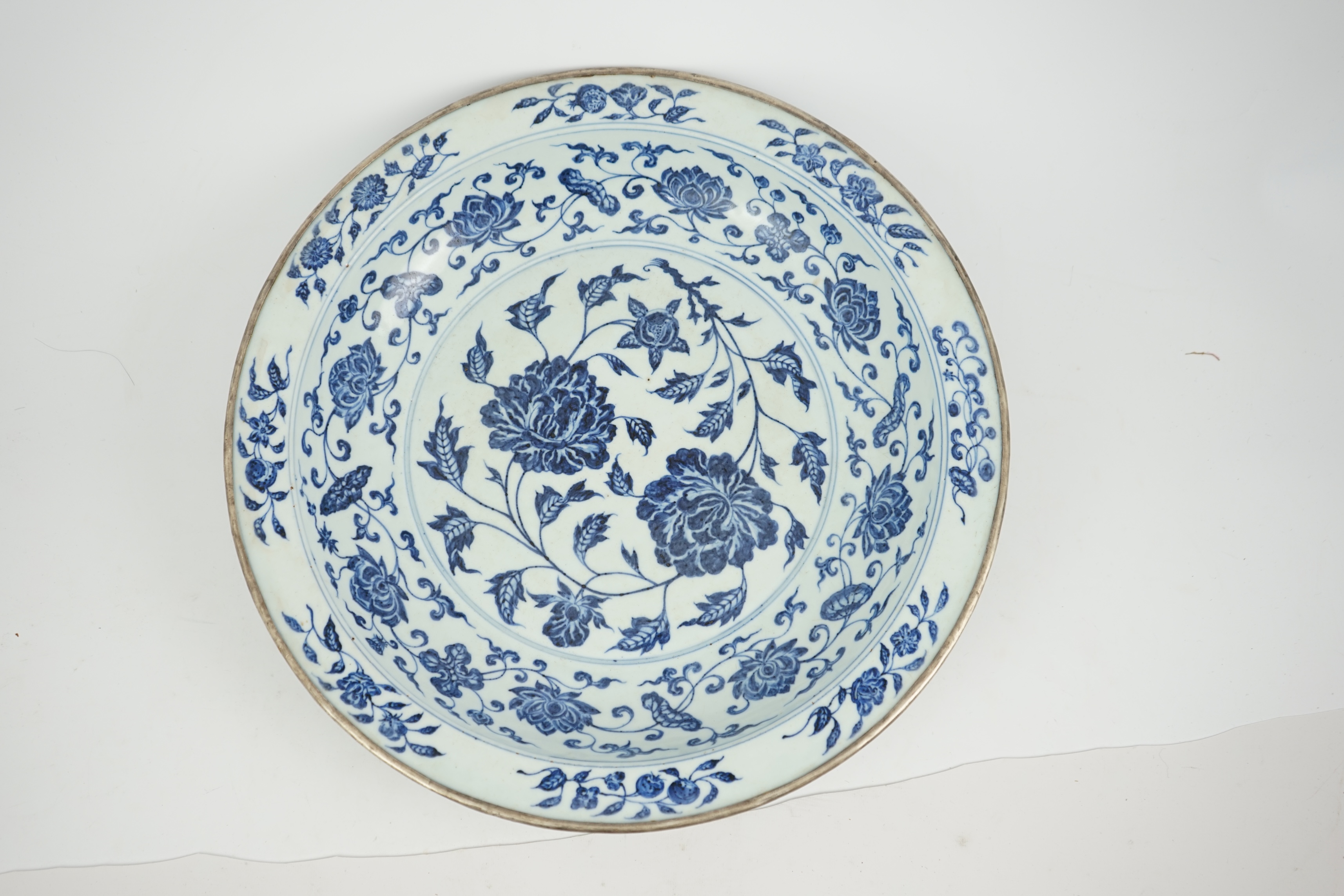 A large Chinese Ming style blue and white dish, possibly 18th century